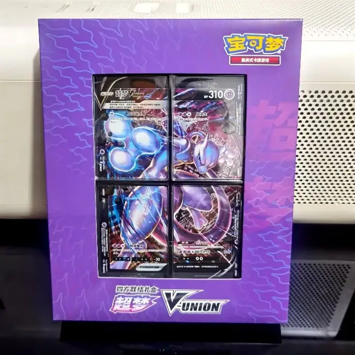 Purple Mewtwo V-UNION physical window box with four card sections, lightning-like linework and 超梦 lettering