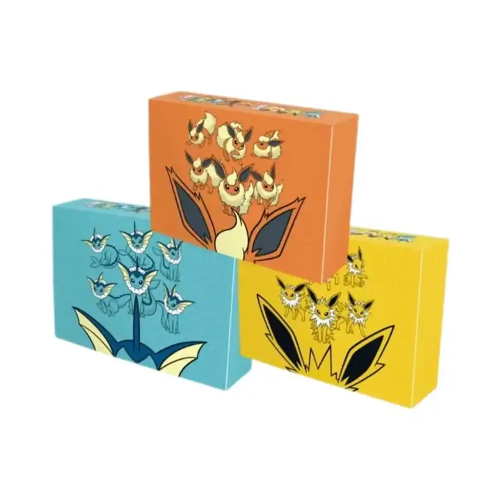 Three closed Eeveelution gift boxes grouped together: orange Flareon behind turquoise Vaporeon and yellow Jolteon