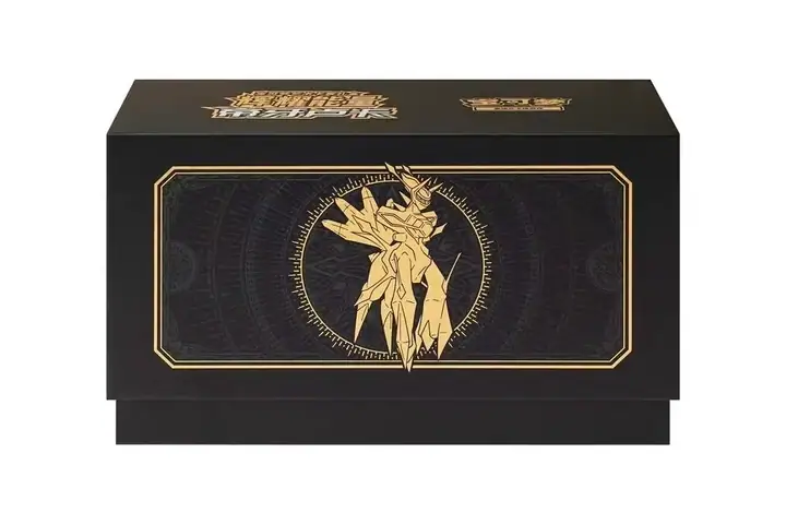 Closed black Dialga gift box with gold character line art inside a circular motif and thin rectangular border