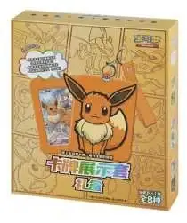 Small yellow Eevee storage-product package with large Eevee face and a pictured card, preserved at 210 by 251 pixels